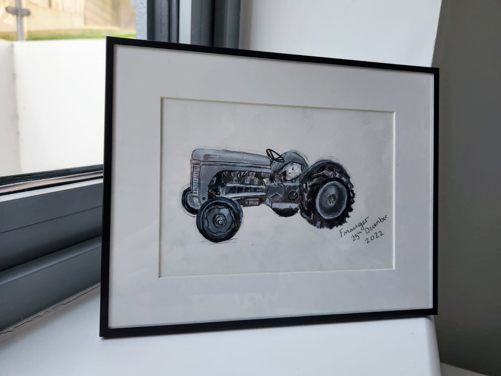 A framed charcoal and graphite drawing of a Ferguson TEA20 grey tractor
